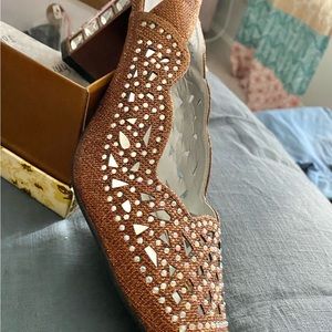 John Fashion CoffeeRhinestone & Sequin Glass Heel Size 10M. Preowned, worn once.